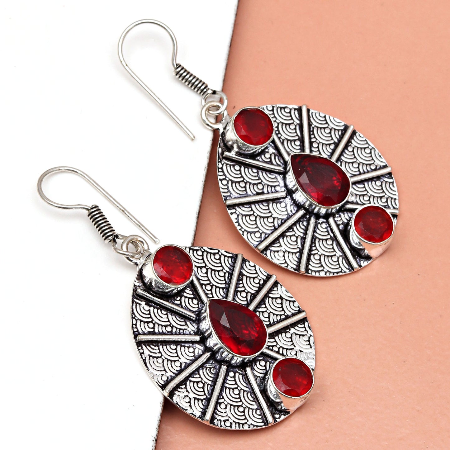 Classic Garnet Silver Stud Earrings For Special Occasions.