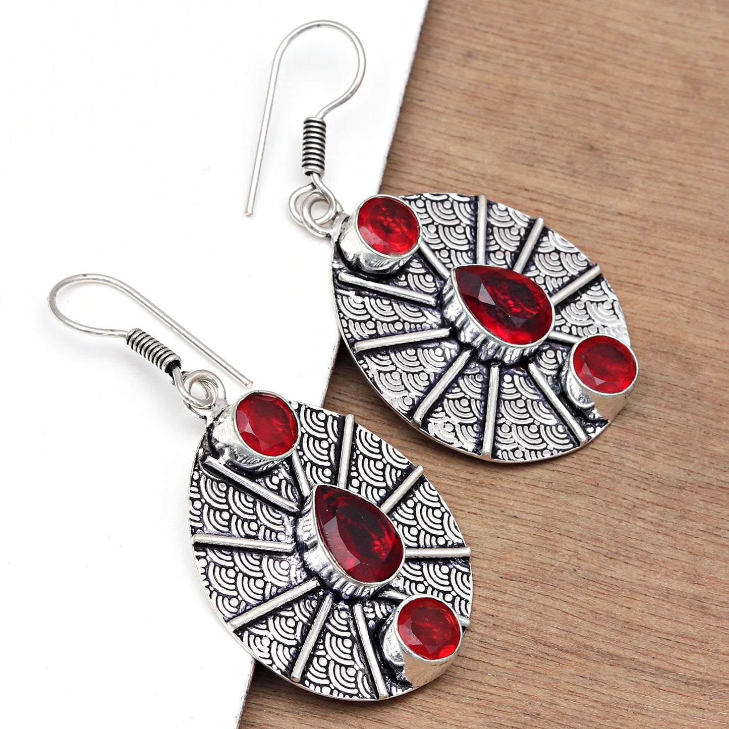 Classic Garnet Silver Stud Earrings For Special Occasions.